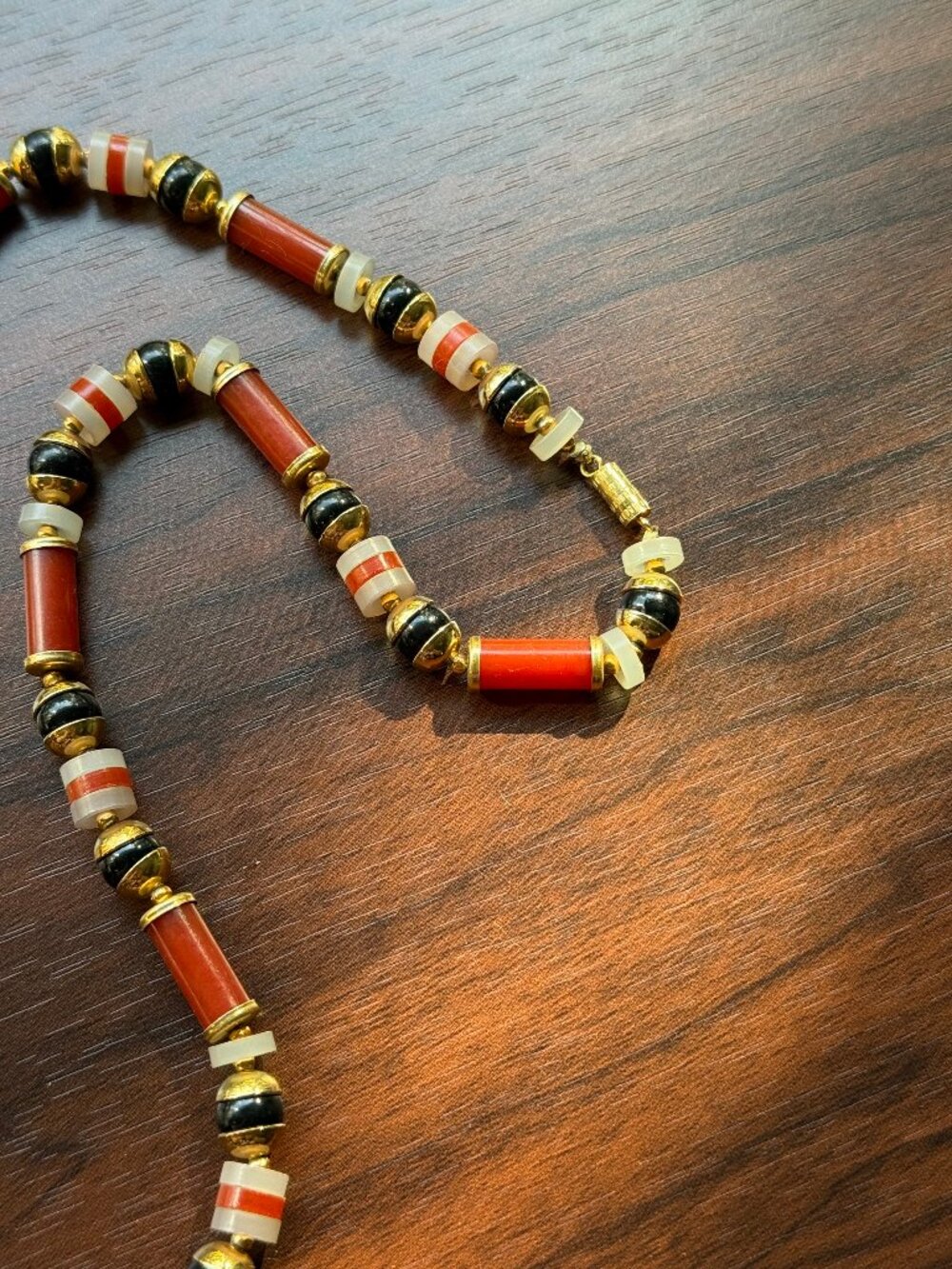 Red, Black, and Gold Late 70s Plastic Beaded Necklace - Picture 2 of 3
